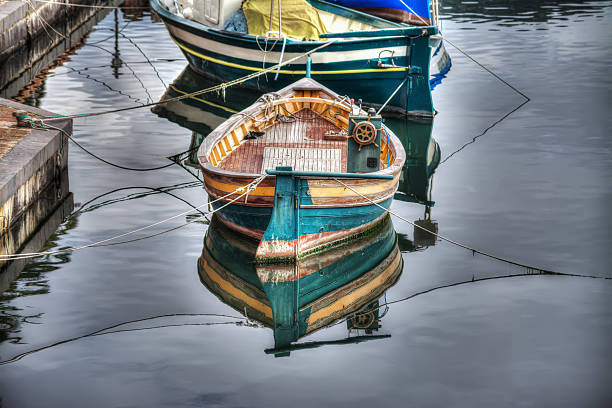 istock small wooden boat moored in Temo river 532202451