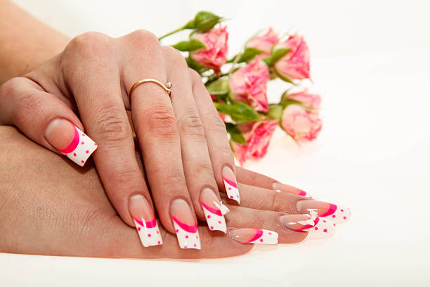 istock Colorful manicure with points on a lilac 532202627