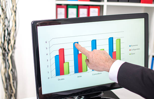 istock Businessman showing a graph on the screen 532203253