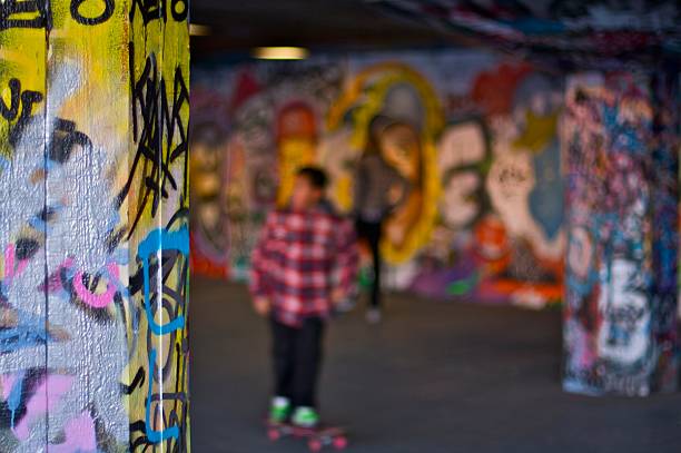 istock Skateboarder amongst grafitti 532203617