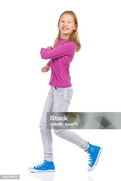 Laughing Girl Marching Stock Photo - Download Image Now - Child, Walking, White Background