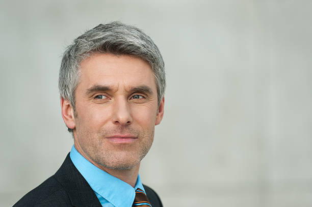 istock Germany, Hamburg, Businessman looking away 532221919