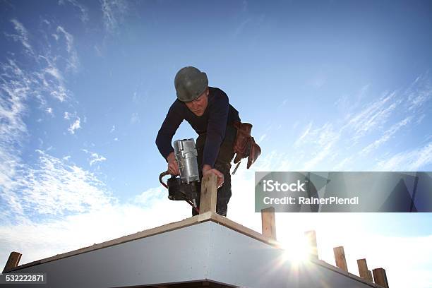 Construction Worker Stock Photo - Download Image Now - Building Contractor, Rooftop, 2015