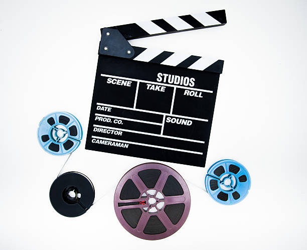 istock Clapper and 8mm different reels isolated on white background 532225495