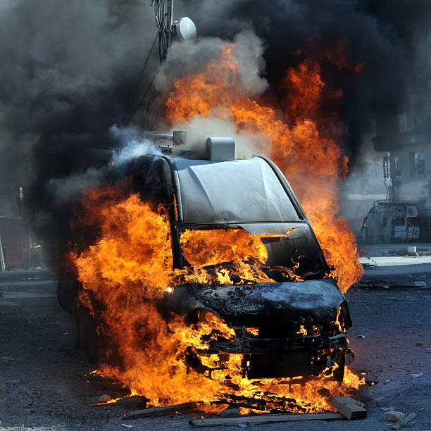 istock Burning van with large flames and black smoke 532226069