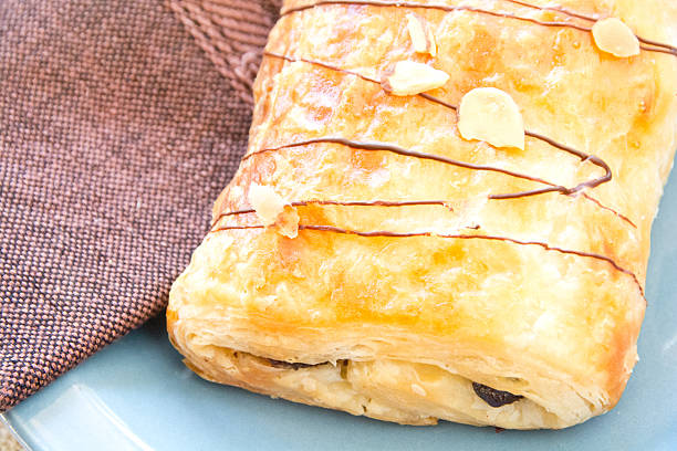 istock Chocolate croissant with brown napkin 532238681