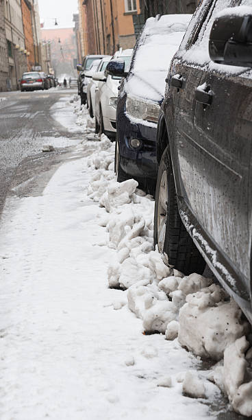istock parked cars in snow storm 532240909