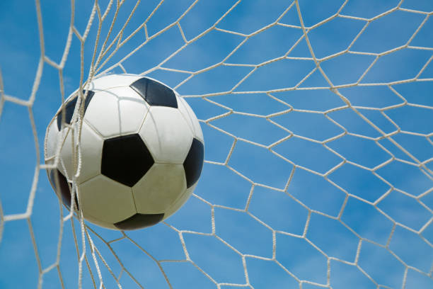 istock Soccer ball in the goal after shooted 532242275