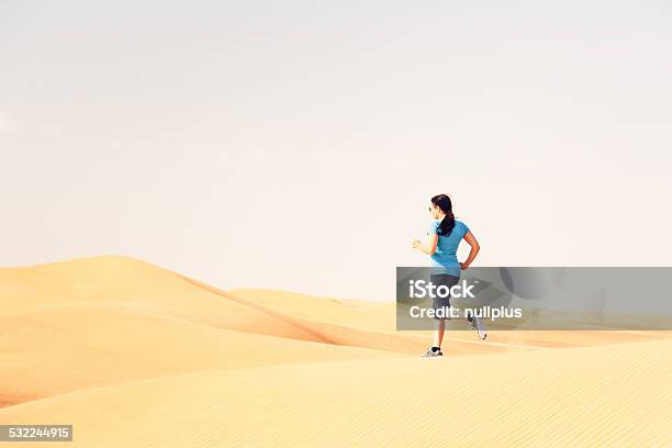 Jogging In The Desert Stock Photo - Download Image Now - Dubai, Fun, 20-29 Years