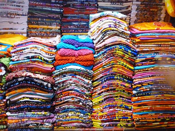 istock colourful clothes stacked in a retail store 532248278