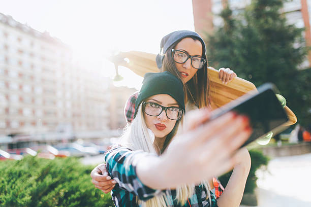 istock Two cheerful friends with skateboard having fun 532249168
