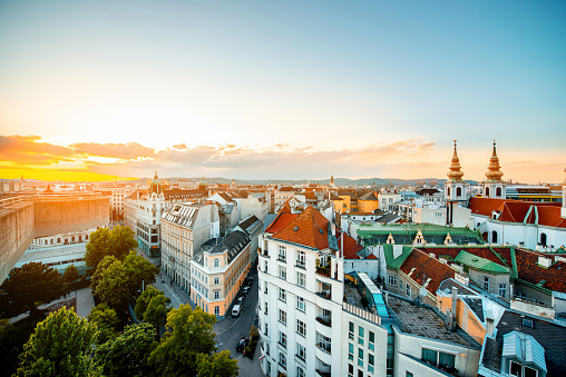 Panoramic cityscape view on Vienna city with Mariahilfer church towers on the sunset in Austria