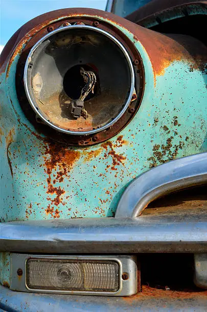 A close up image of a missing Pontiac headlight.
