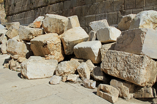 Fallen stone blocks from a section of the wall surrounding the Temple mount (Wailing wall) which was destroyed by roman soldiers. 