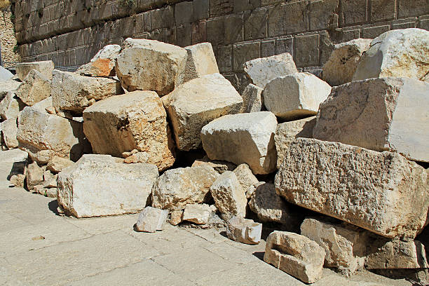 Fallen Stones Outside the Temple Mount Fallen stone blocks from a section of the wall surrounding the Temple mount (Wailing wall) which was destroyed by roman soldiers.  synagogue stock pictures, royalty-free photos & images
