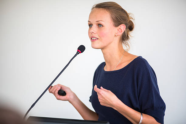 istock Pretty, young business woman giving a presentation 532257007
