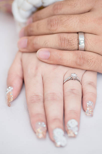 istock man and woman with wedding ring 532257016