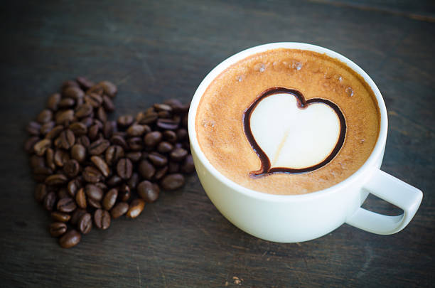 istock latte art and heart coffee beans 532257203