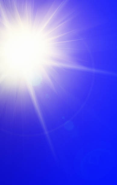 istock Brilliant noonday sun in vividly blue sky 532257466