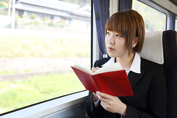 istock Business woman talking on the phone during her commute 532257842