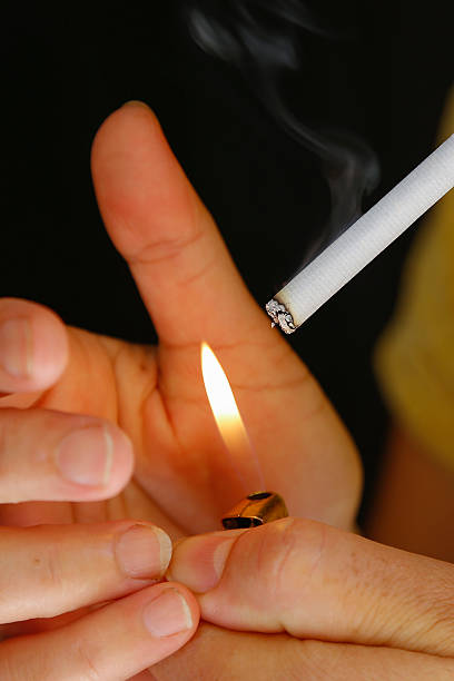 istock Woman smoking cigarette in balcony. 532257872