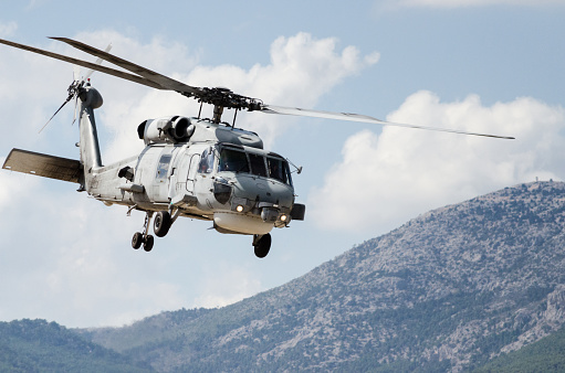 Blackhawk helicopter uh 60 on sky mountain back