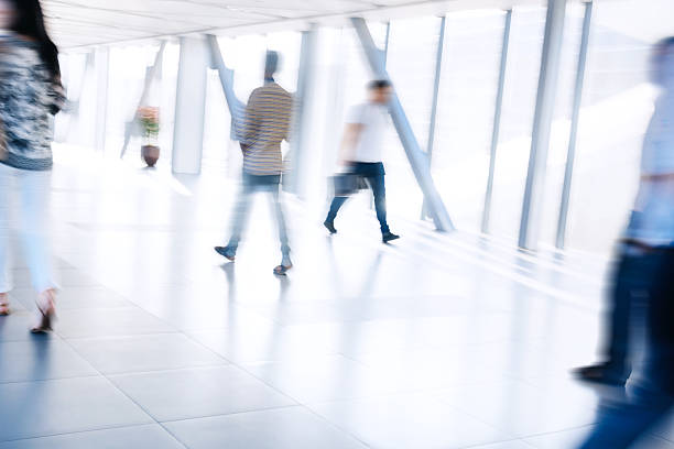 istock Motion Blur of People Walking in Corridor 532261361