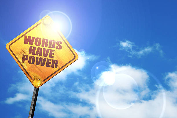 words have power, 3D rendering, a yellow road sign stock photo