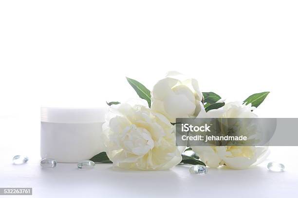 Cosmetic Can Ore Jar In White Color With Beautiful Peony Stock Photo - Download Image Now