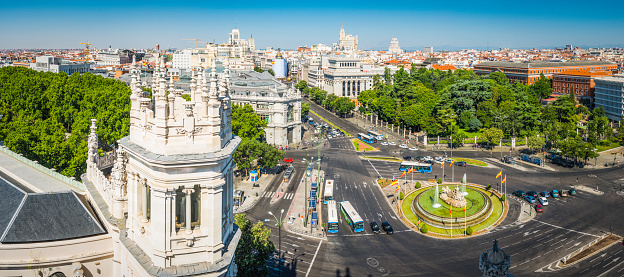 View from the roof of the Palacio de Comunicaciones overlooking the busy Plaza de Cibeles towards the heart of central Madrid, Spain's vibrant capital city. ProPhoto RGB profile for maximum color fidelity and gamut.