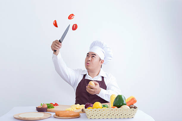 istock Chef cutting fresh vegetables in the air 532269260