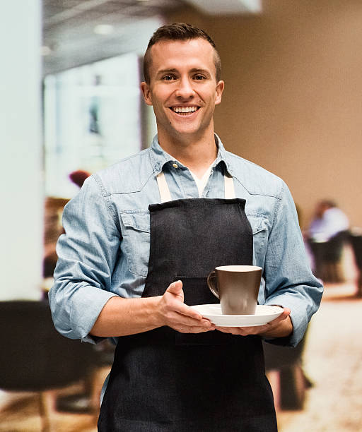istock Smiling batista in restaurant 532270288