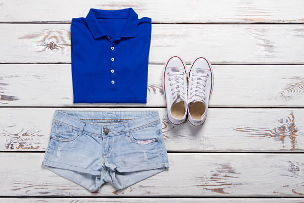istock Blue polo shirt and light jeans shorts. 532273226