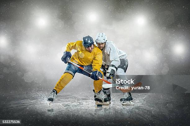 Ice Hockey Player On The Ice Outdoors Stock Photo - Download Image Now - Ice Hockey, Hockey, Success