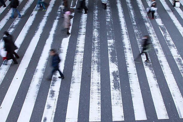 istock Blurred Pedestrians Rushing Across Crosswalk 532275920