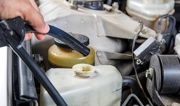 istock Check water reserves car,Car maintenance,Check  car yourself. 532276940