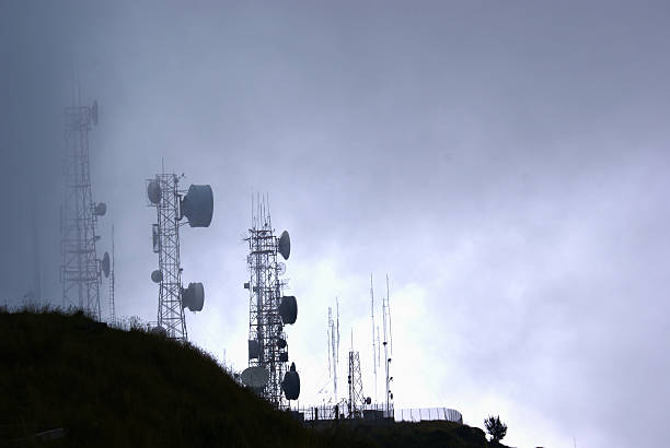 istock Telecommunication towers in fog 532277740