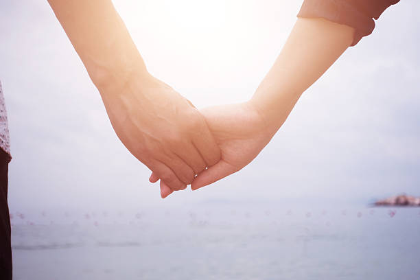 istock Couple of lovers holding their hands 532279086