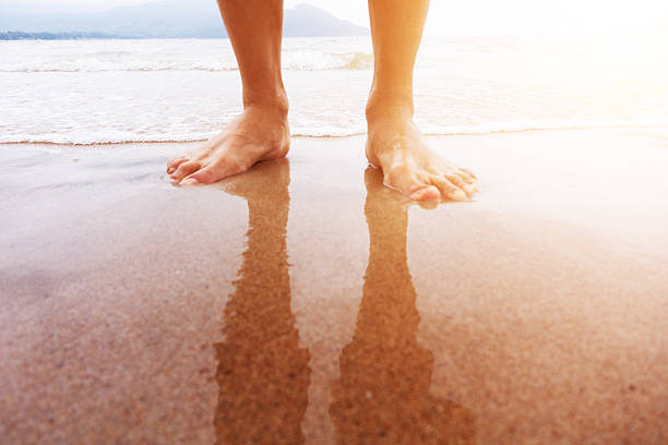 istock Feet standing on the beach 532279534