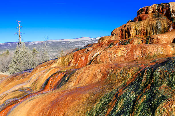 istock Half cone of a orange, mineral covered colorful hot spring 532282371