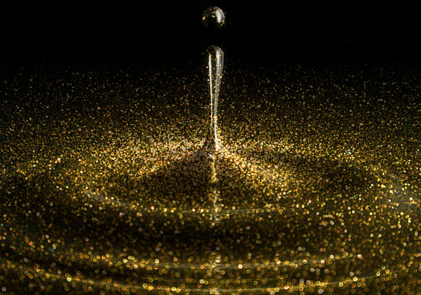 Golden shiny liquid stock photo