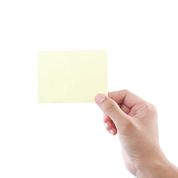 istock hand holding yellow business card 532283181