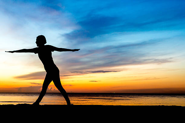 istock women playing yoga 532285029