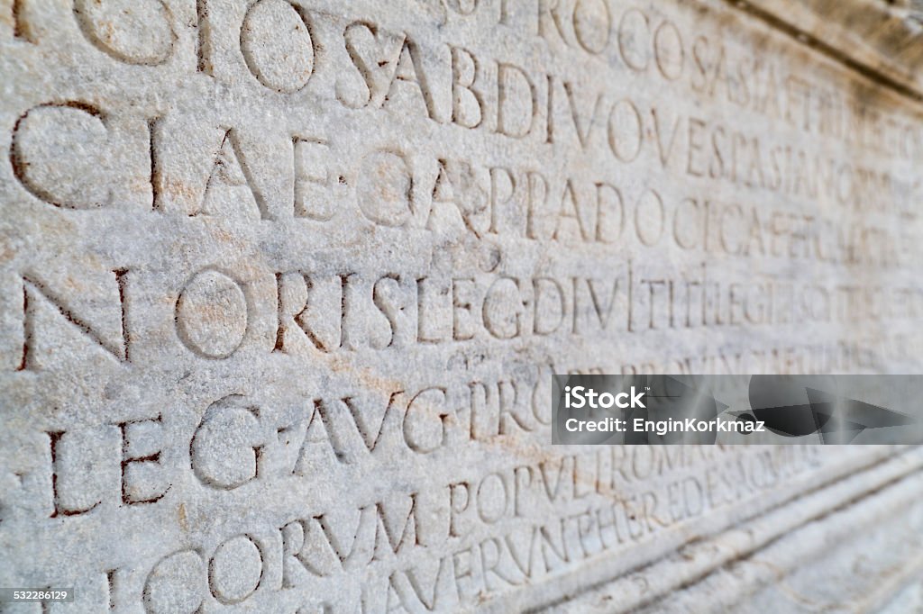 Ruins of Ephesus Ancient Greek scripts on Marble in Ephesus, Turkey Alphabet Stock Photo