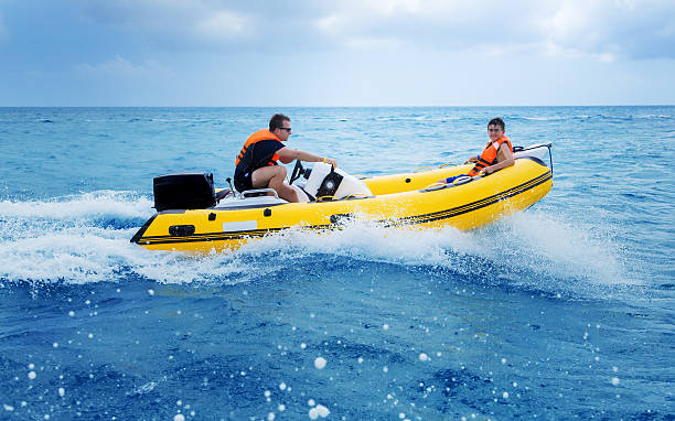 Father and son on an inflatable boat