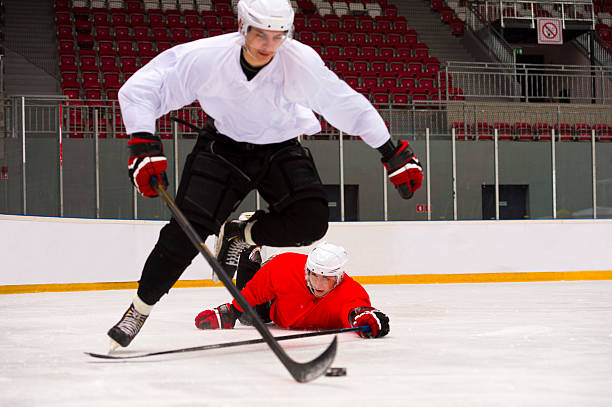 istock Two Ice Hockey Players in a Hard Duell 532288127