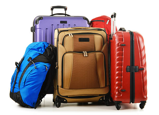 istock Suitcases and rucksack isolated on white 532302945