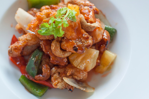 Thai and Chinese Food Chicken Stir Fried with Cashew Nuts, Thai word is \