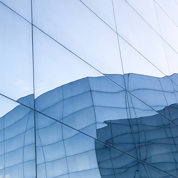 istock facade of modern glass building with blue reflections 532305679