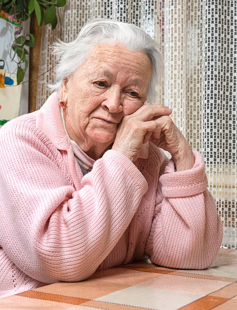 istock Old sad woman 532320817